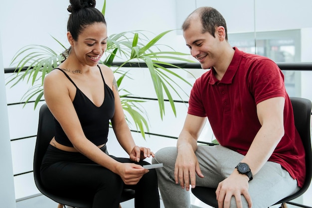 young latina girl being advised by member company about information 664580 267